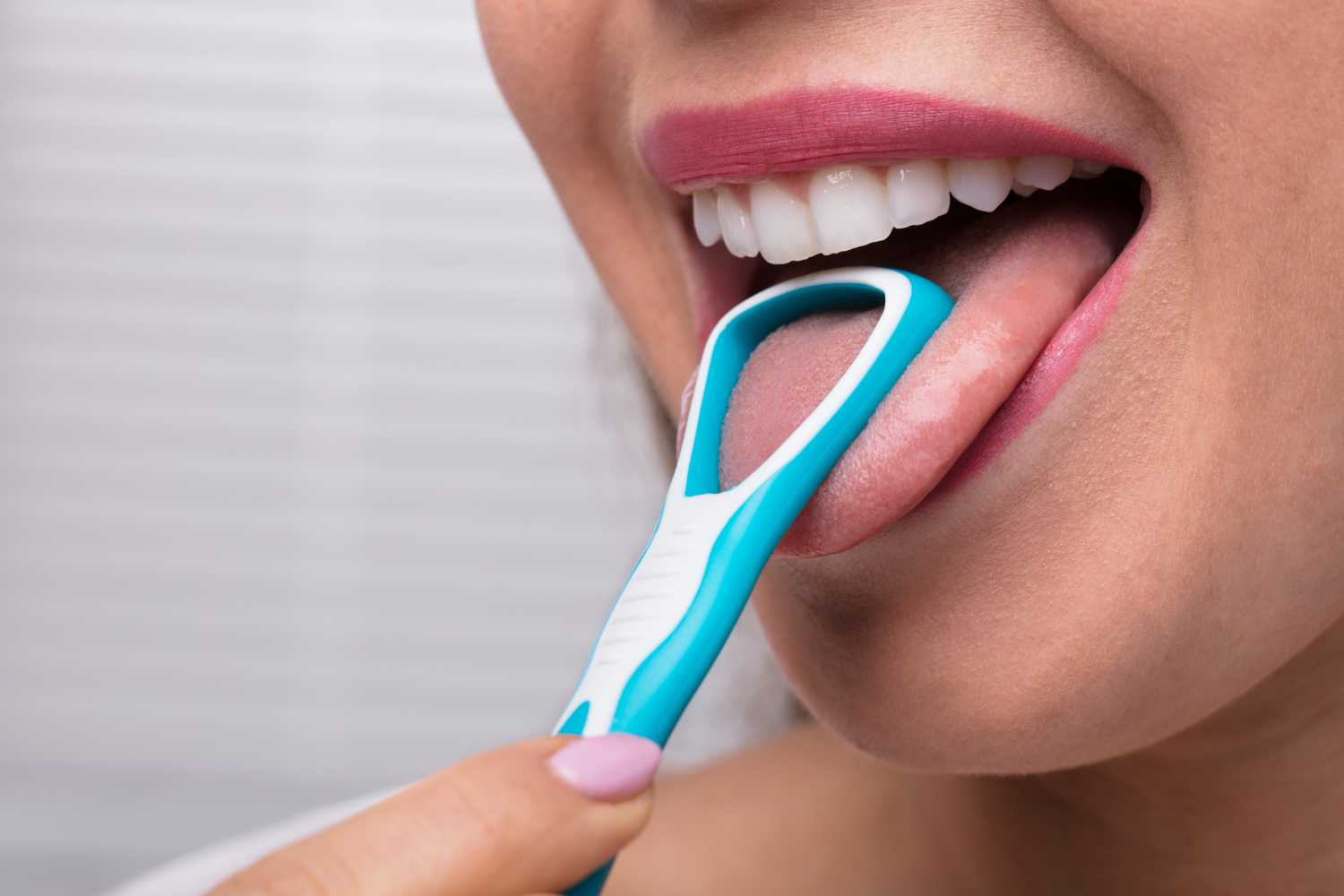 The Benefits of Using a Tongue Scraper to Improve Oral Hygiene - Imperial  Dental Center